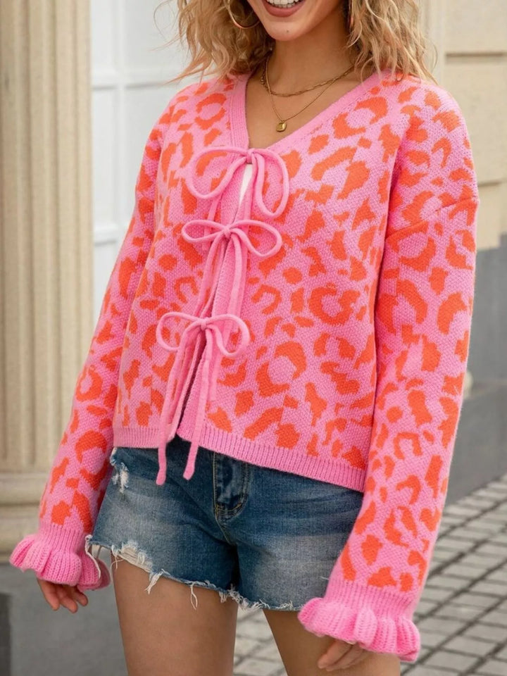 Leopard knit tie-front cardigan with ruffle cuffs