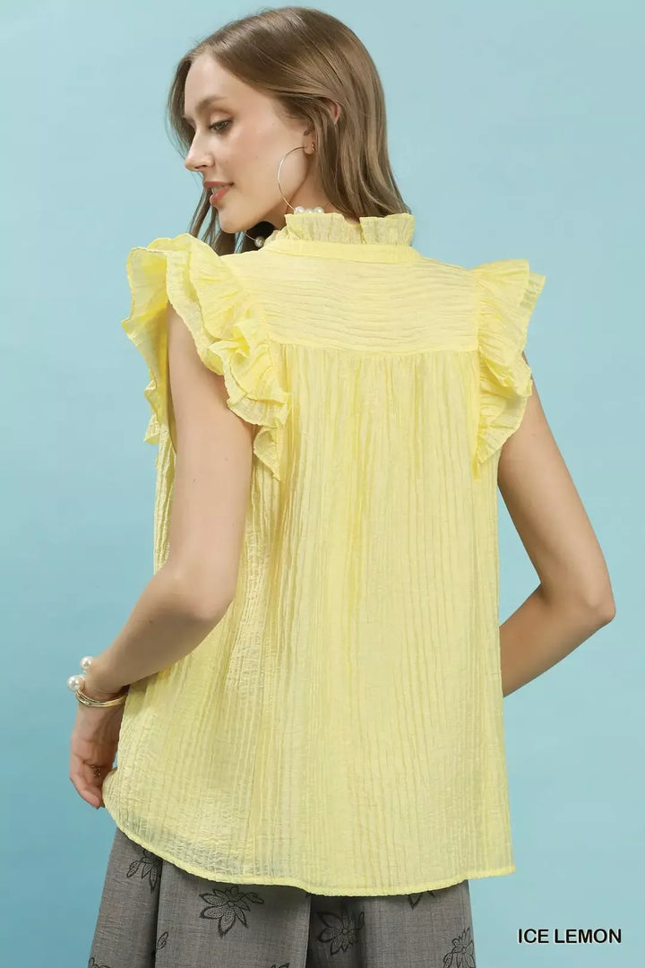Textured split V-neck top with ruffle cap sleeves