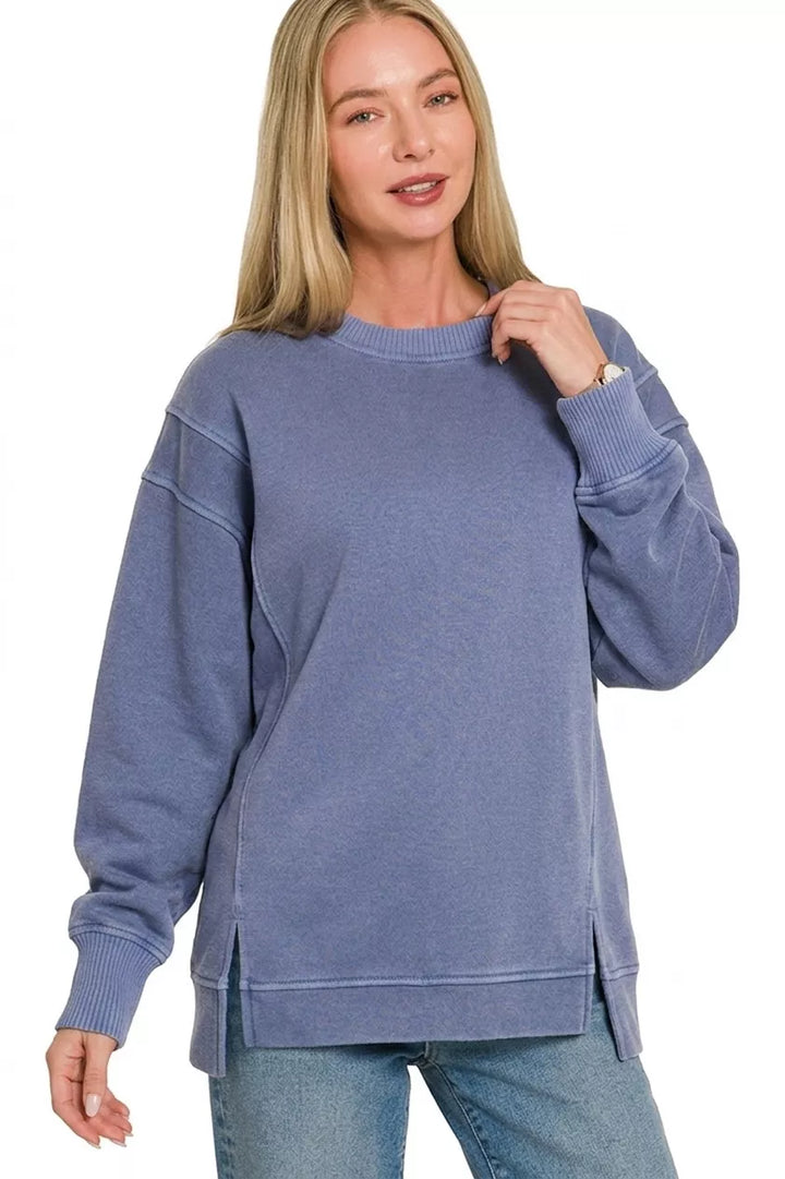 Pigment-dye fleece sweatshirt with exposed seams and side slits