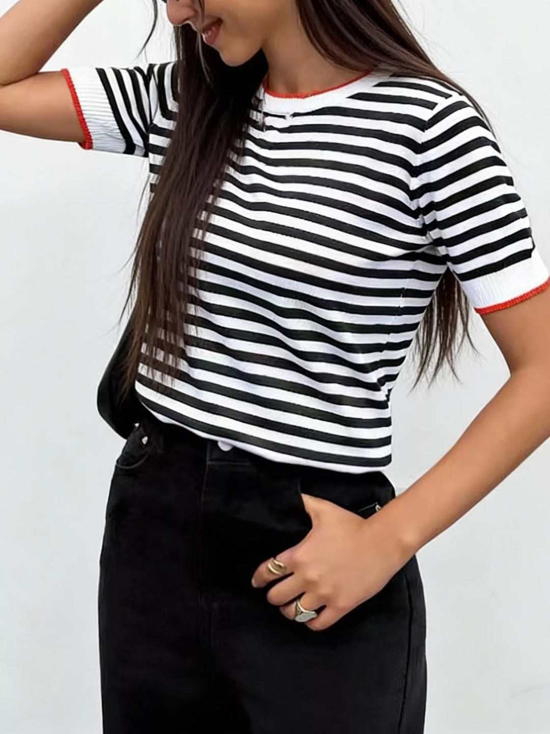 Black Striped short sleeve knit top with contrast ribbed trim