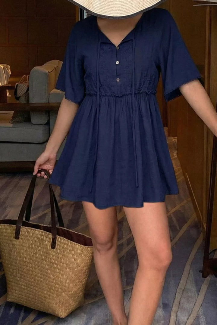 Ruffle hem V-neck blouse with embroidered yoke and lace-trim sleeves