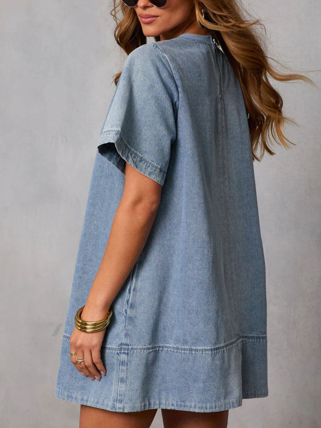 Relaxed short sleeve denim mini dress with tiered hem