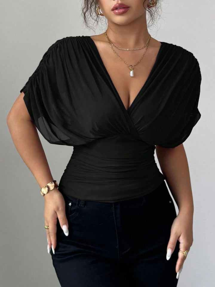 Black Ruched surplice wrap top with short dolman sleeves