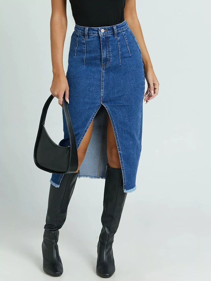 High-waist denim midi skirt with front slit and raw hem