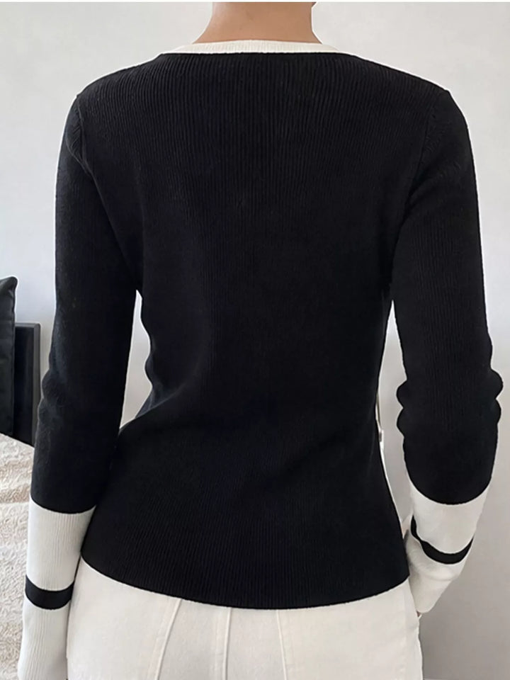 Ribbed knit side slit sweater with contrast trim