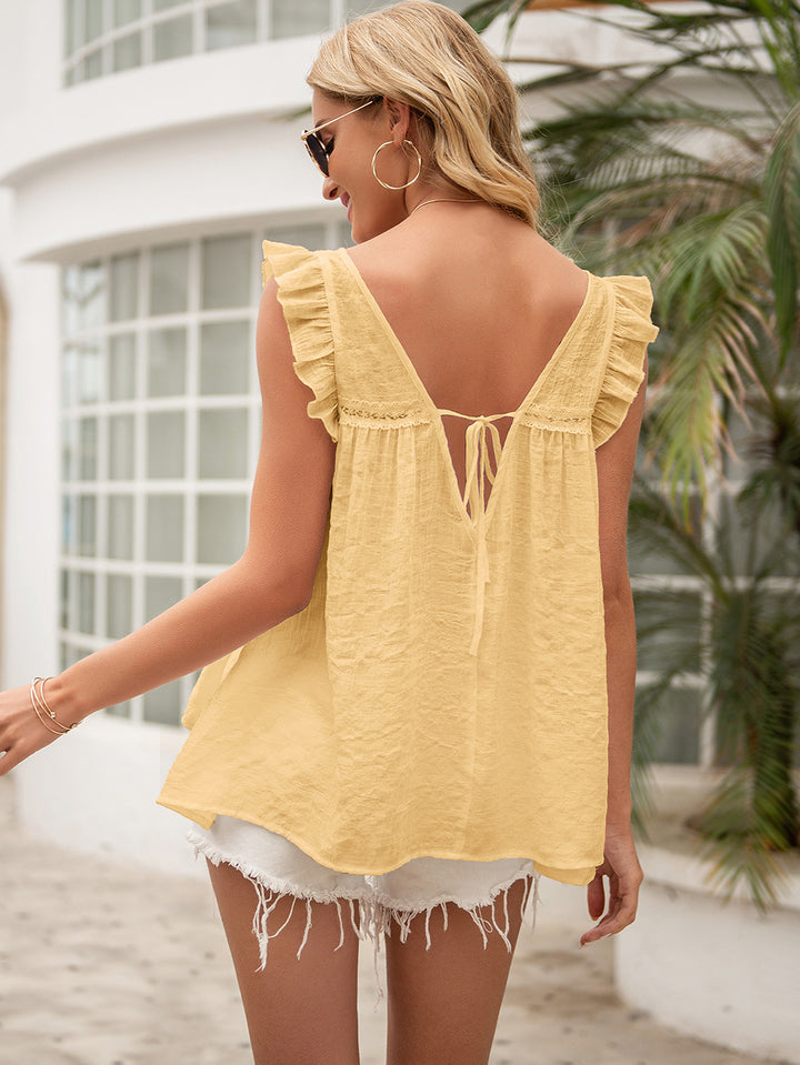 Ruffled cap sleeve V-neck blouse with crochet trim and tie back