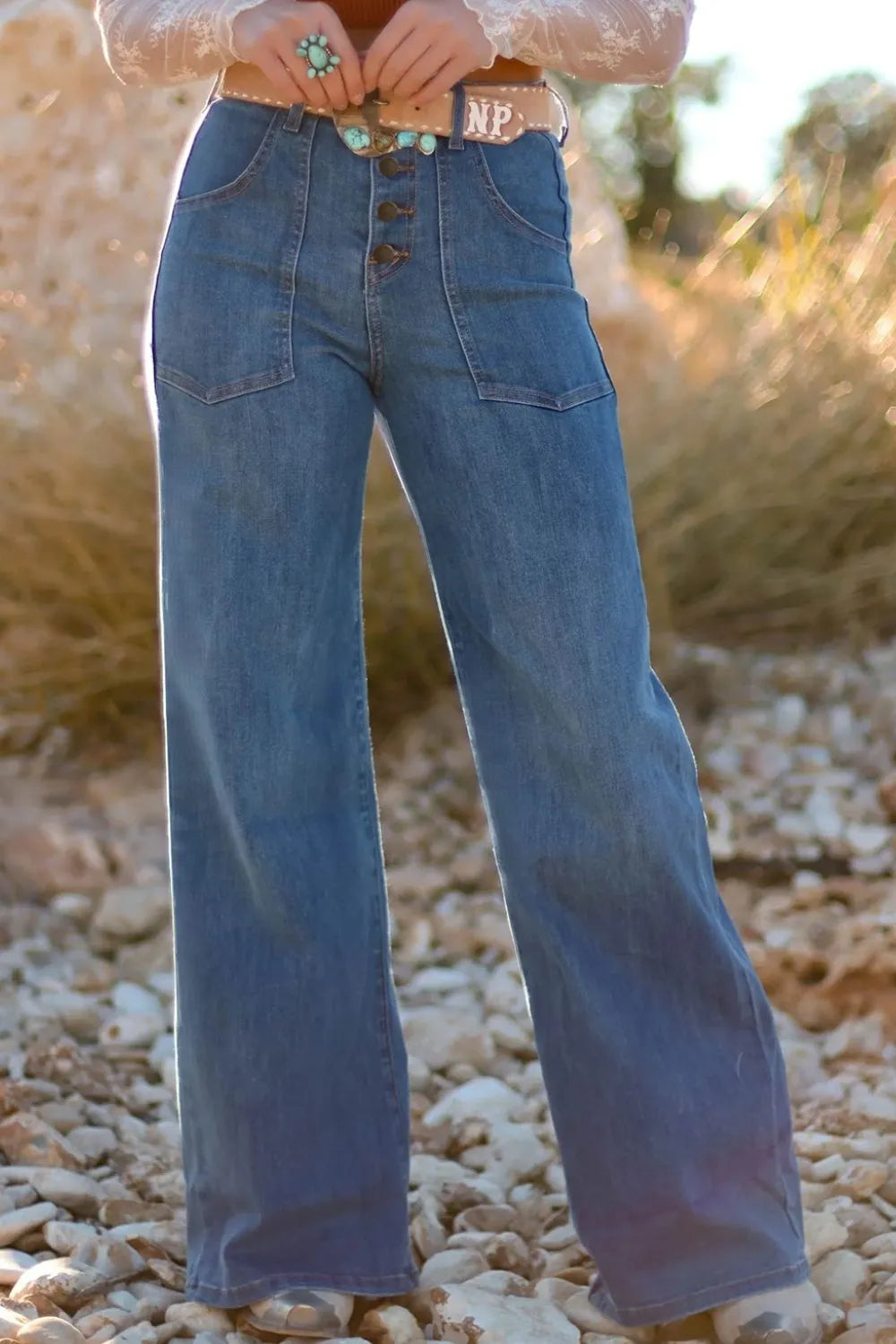 High-rise wide-leg button-fly jeans with patch pockets