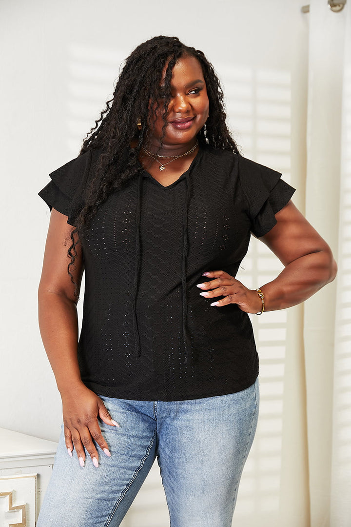 Eyelet tie-neck blouse with tiered flutter sleeves