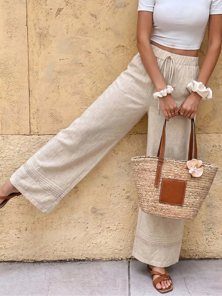 Drawstring wide-leg linen-blend pants with lace-trim hem