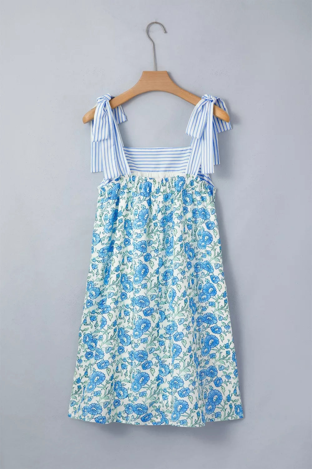 Floral babydoll mini dress with striped tie straps