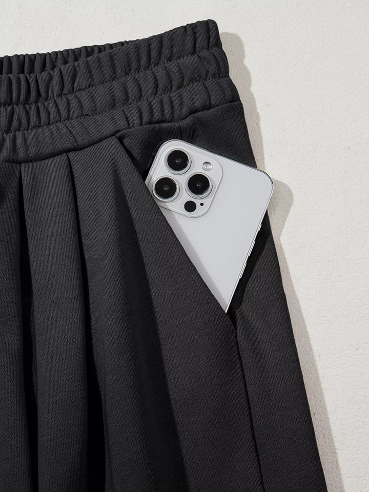 High-rise wide-leg pleated sweatpants with drawstring