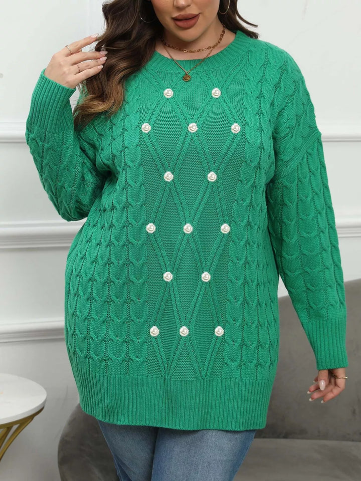 Cable knit dropped shoulder sweater with floral buttons