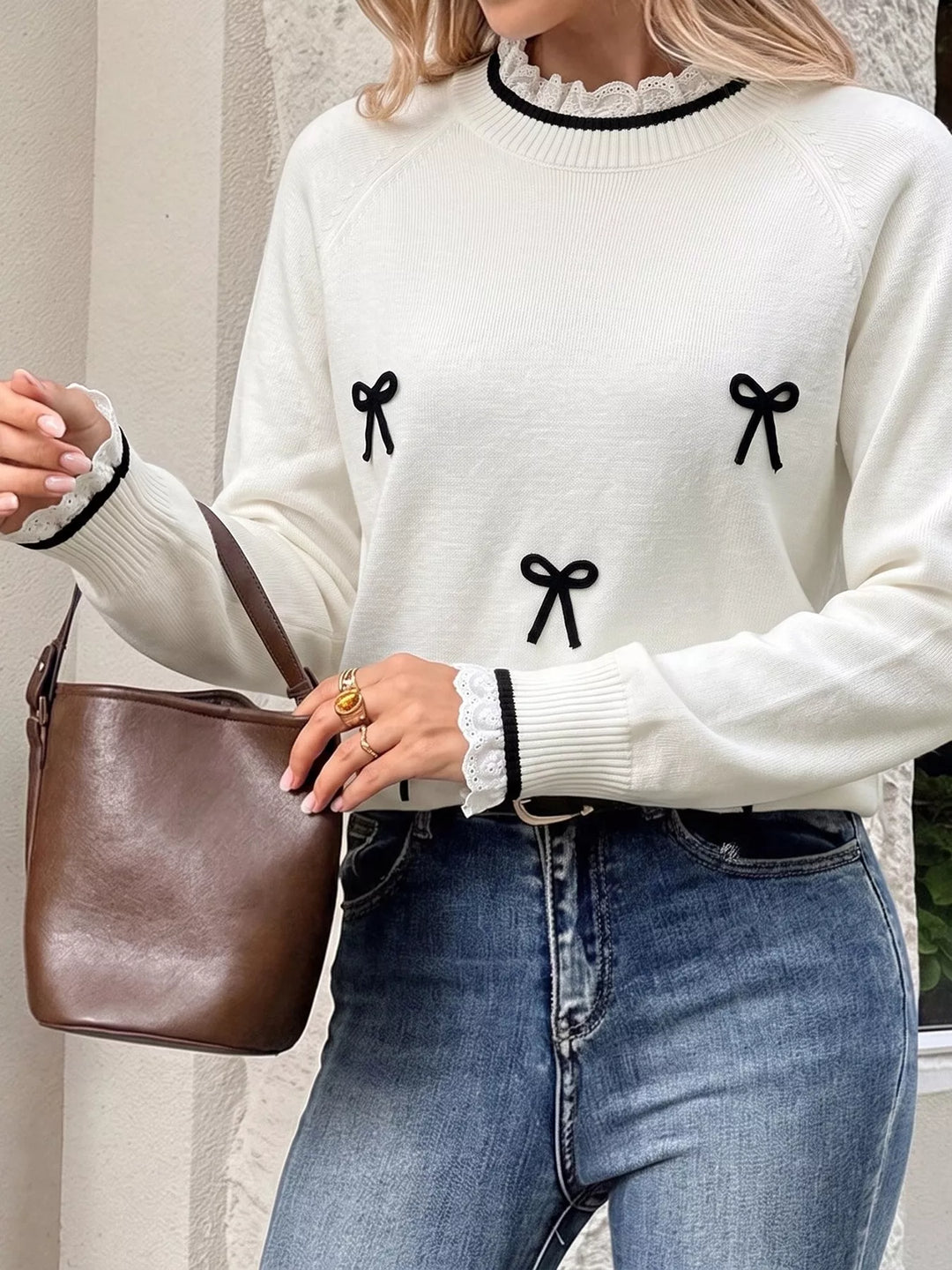 Lace trim mock neck sweater with contrast bow appliqués