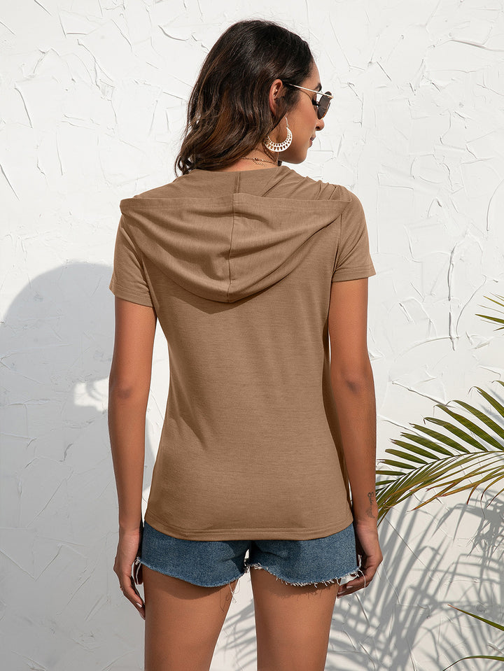 Half-zip short sleeve hooded top with flap pockets