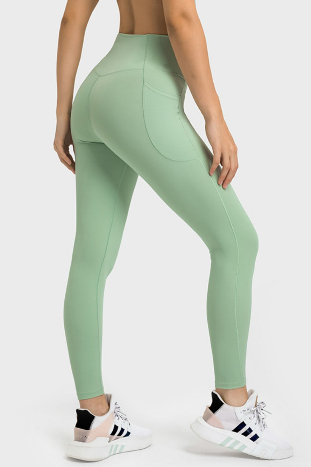 Crossover V-waist yoga leggings with side pockets