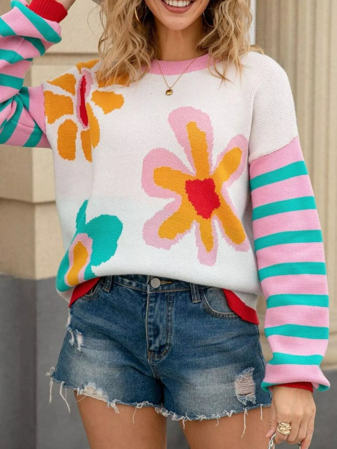 Mod floral crew neck sweater with striped sleeves