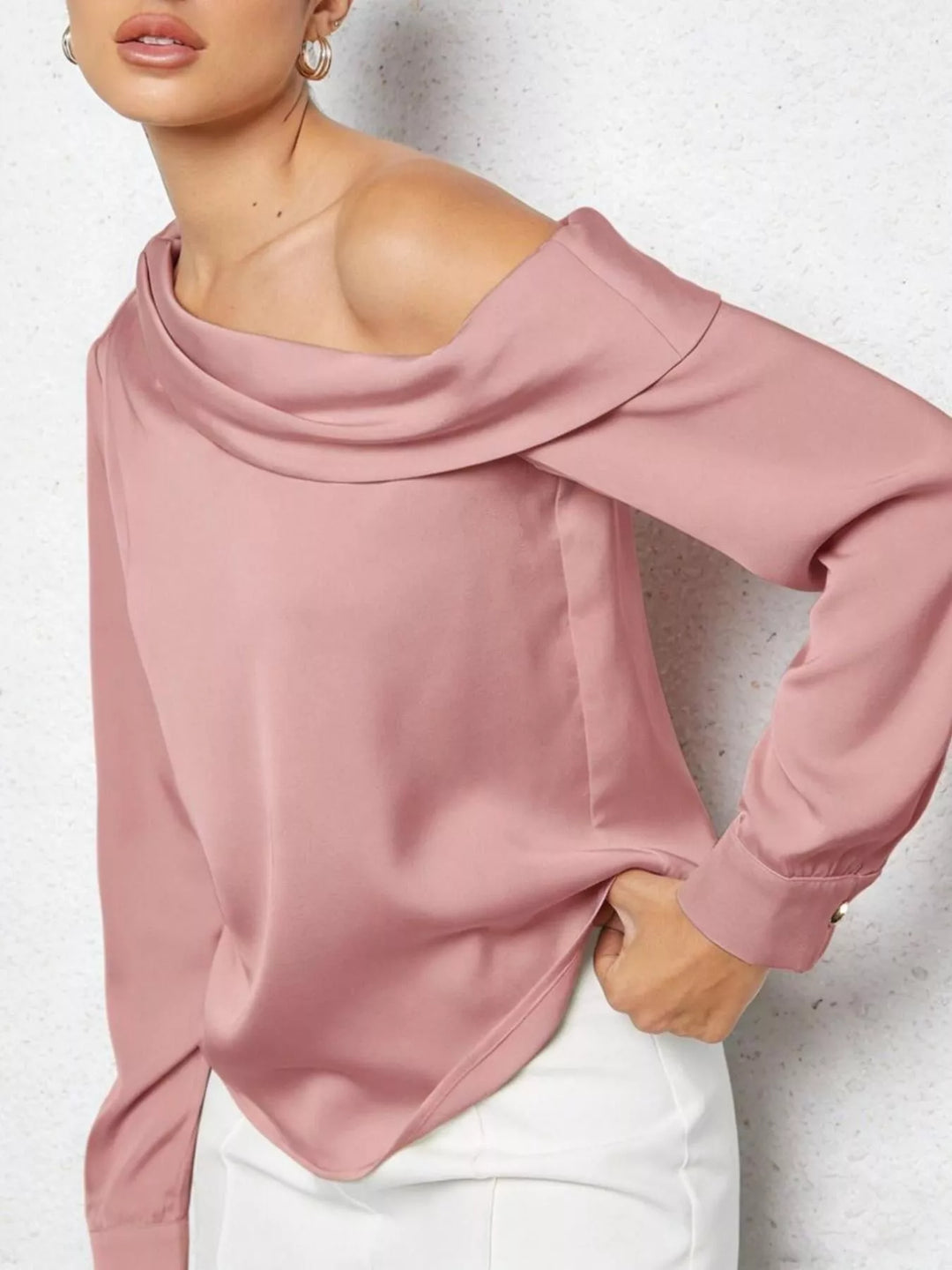 Draped one-shoulder satin blouse with long sleeves and button cuffs
