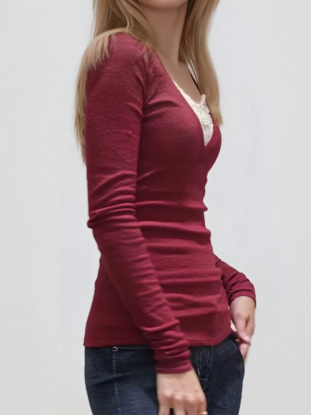 Long sleeve V-neck top with lace trim neckline