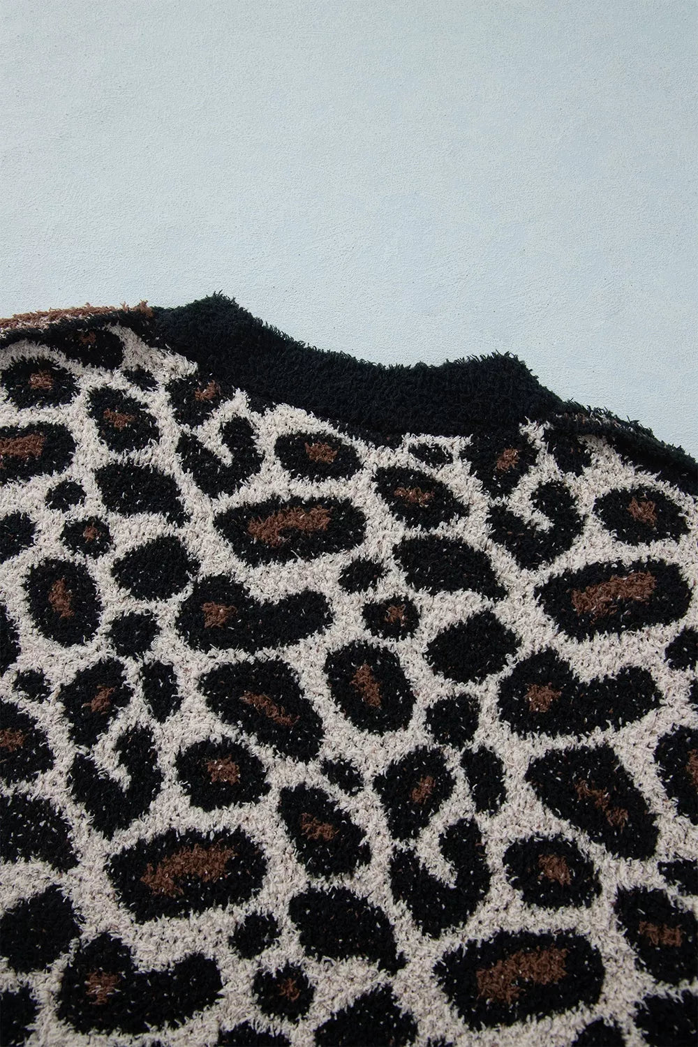 Leopard and star colorblock fuzzy knit pullover sweater