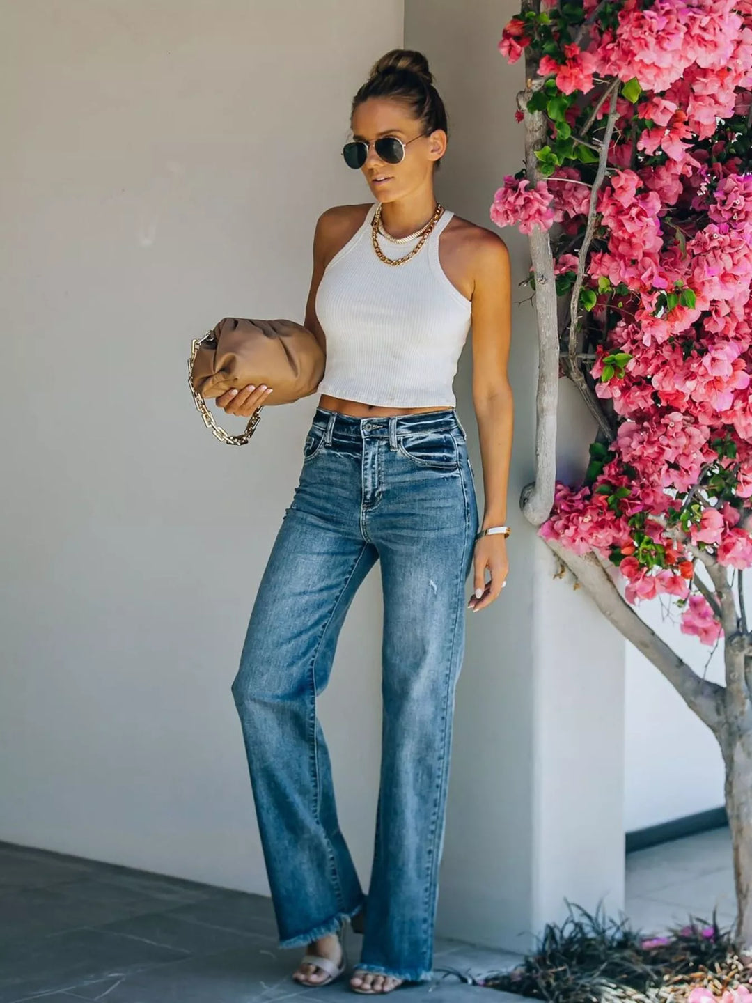 High-rise wide leg jeans with raw frayed hem