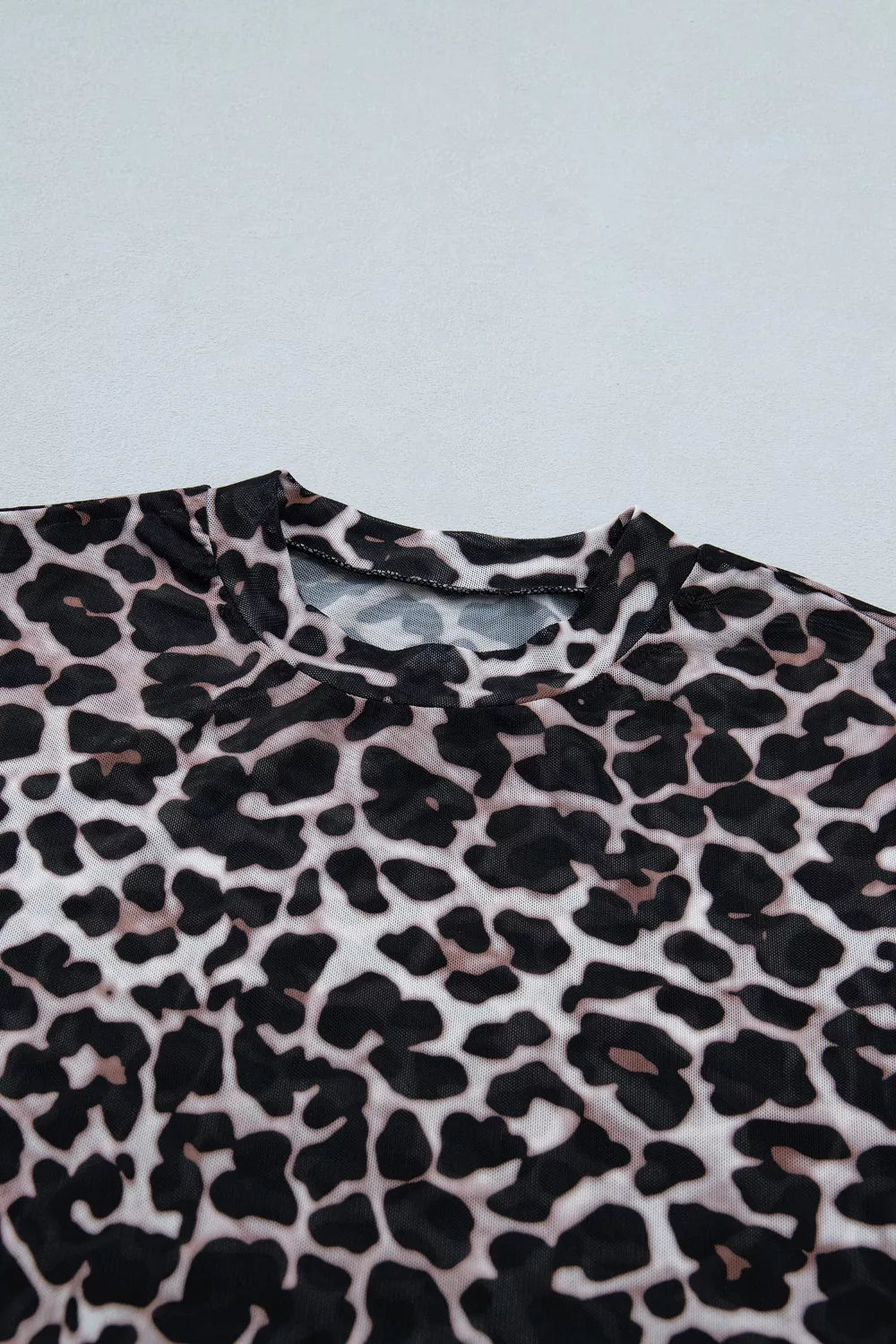 Sheer mesh leopard print fitted short sleeve top