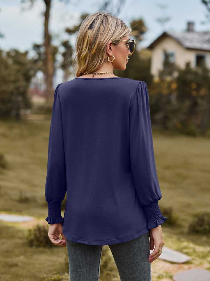 Pintuck pleated puff sleeve blouse with smocked cuffs