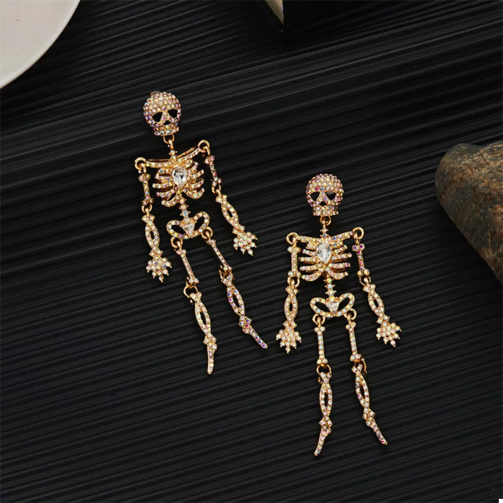 Articulated rhinestone skeleton drop earrings