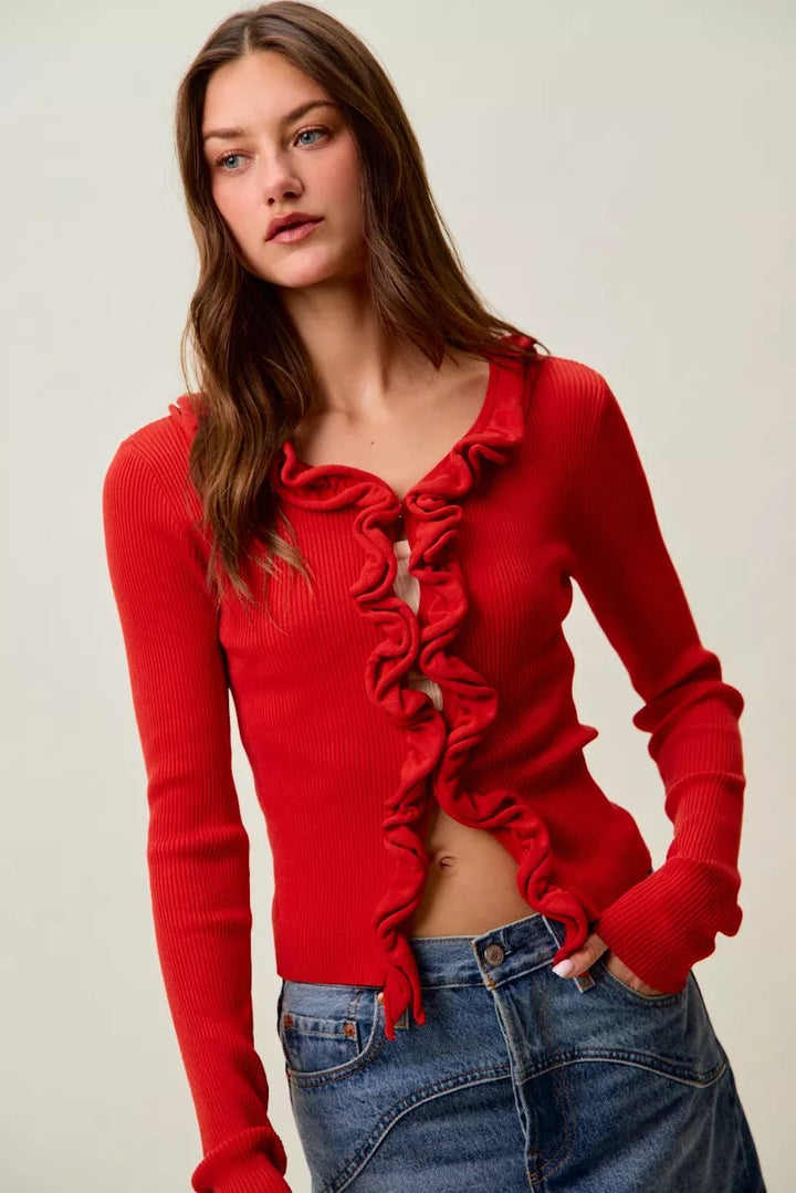 Ribbed knit cardigan with cascade ruffle trim