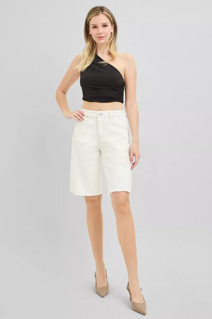 Relaxed Bermuda denim shorts with floral embroidery and raw hem