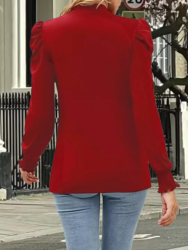 Mock neck puff sleeve blouse with smocked cuffs