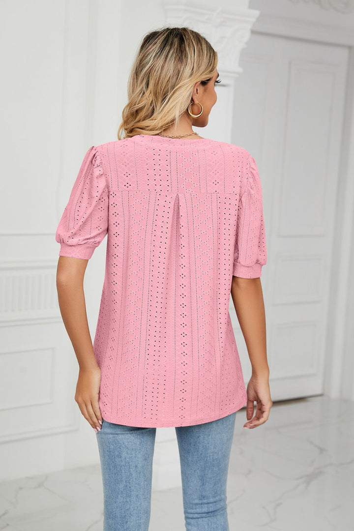 Eyelet puff sleeve top with notched V-neck