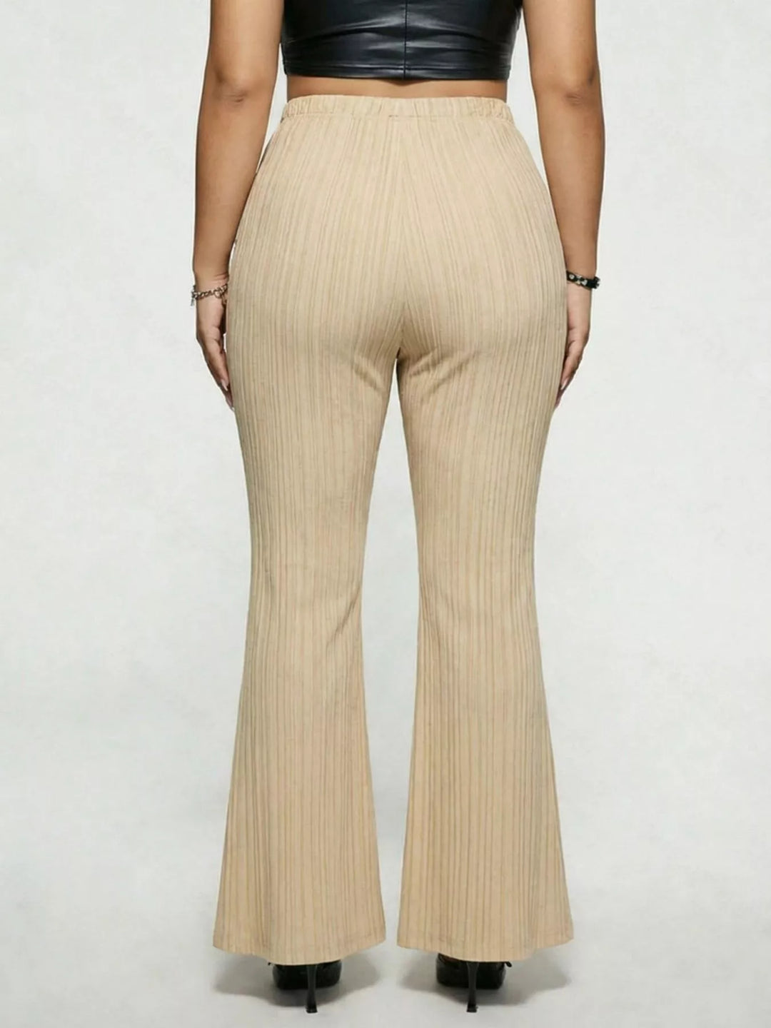 Plus size high-rise ribbed flare pants with buckle detail