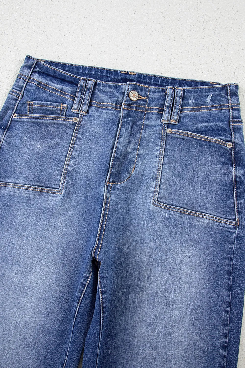 Vintage wash high-rise wide-leg jeans with patch pockets