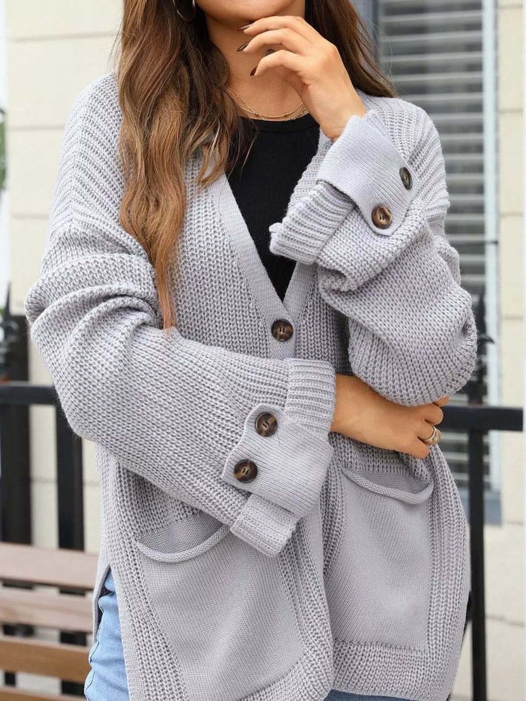 Oversized ribbed knit button-down cardigan with pockets