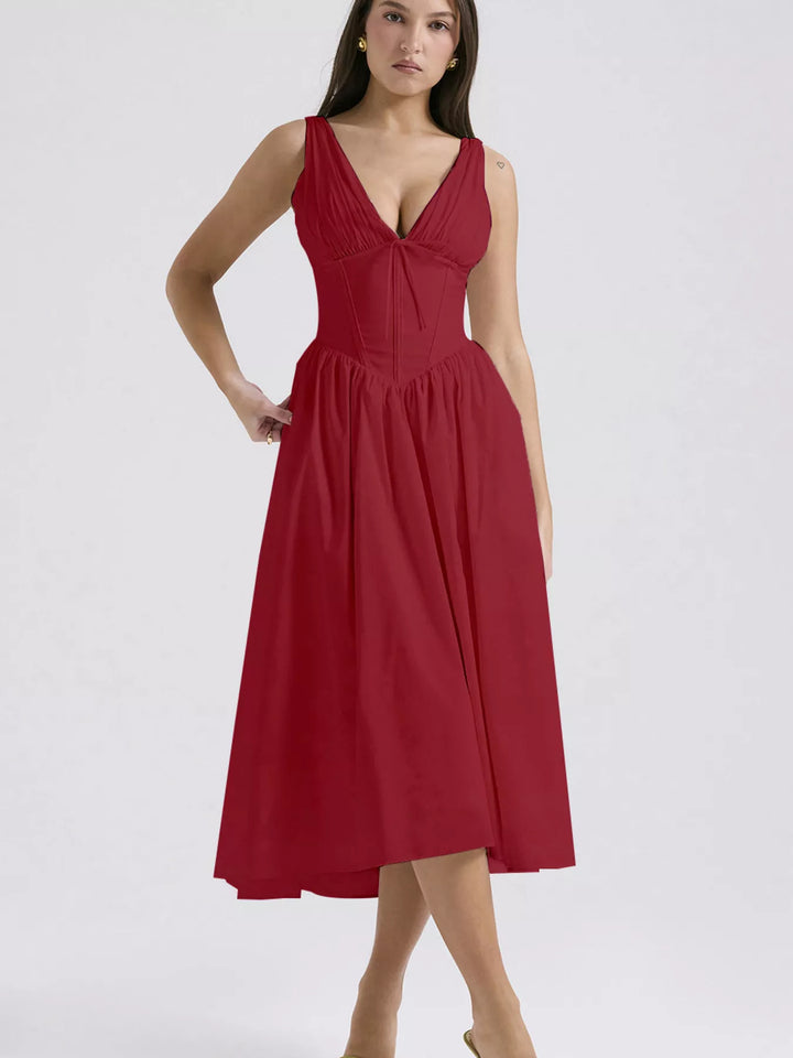 Sleeveless V-neck midi dress with fitted bodice and pockets