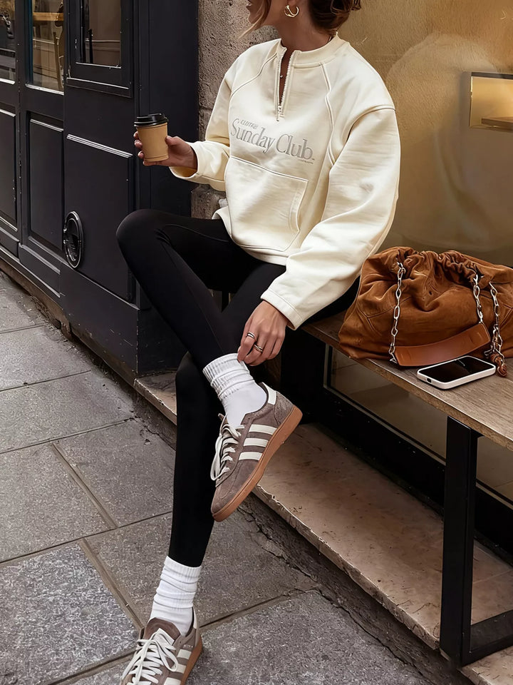 Quarter-zip raglan pullover sweatshirt with front pocket