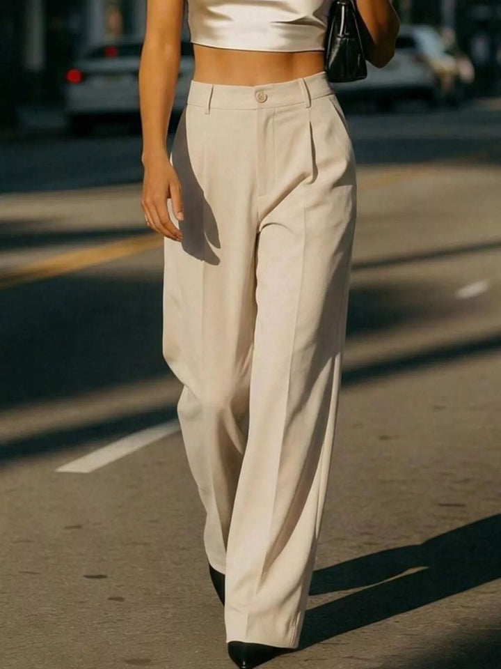 Pleated high-rise wide-leg trousers with side pockets