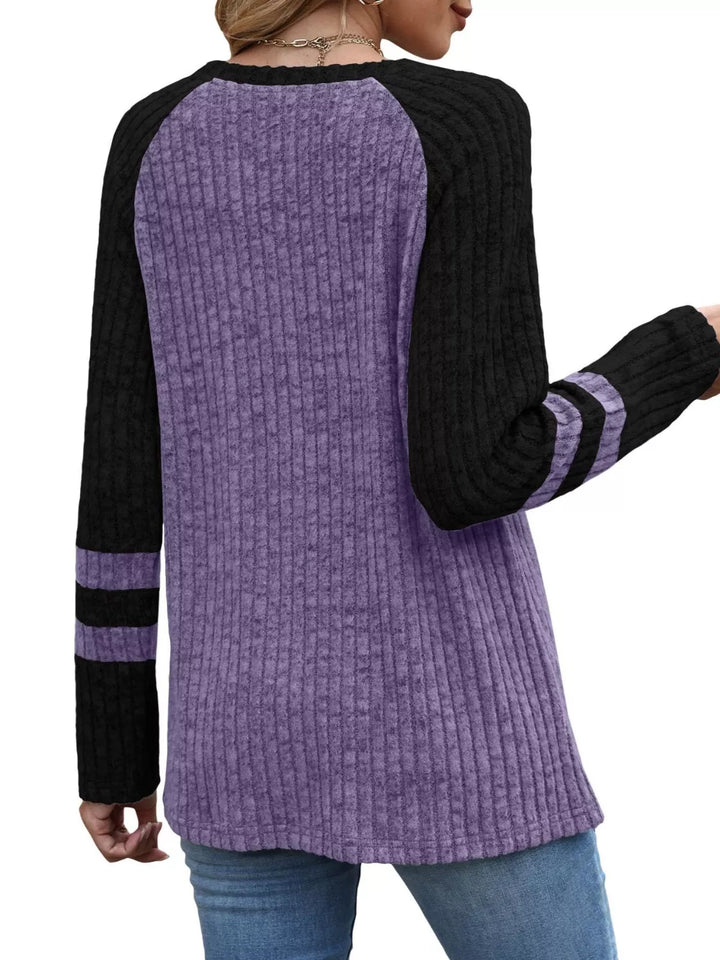Ribbed knit raglan long sleeve top with varsity stripe sleeves