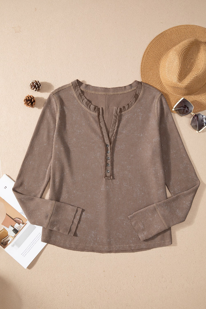 Waffle knit henley top with long sleeves and button placket