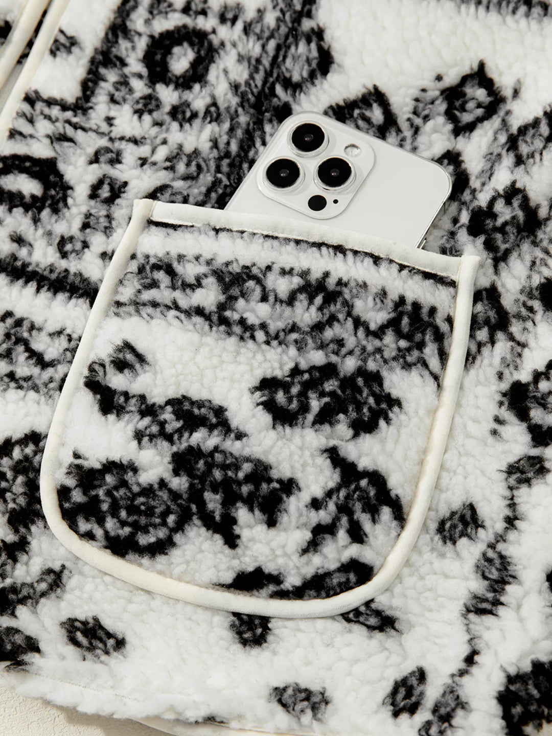 Open-front sherpa vest with paisley print and patch pockets