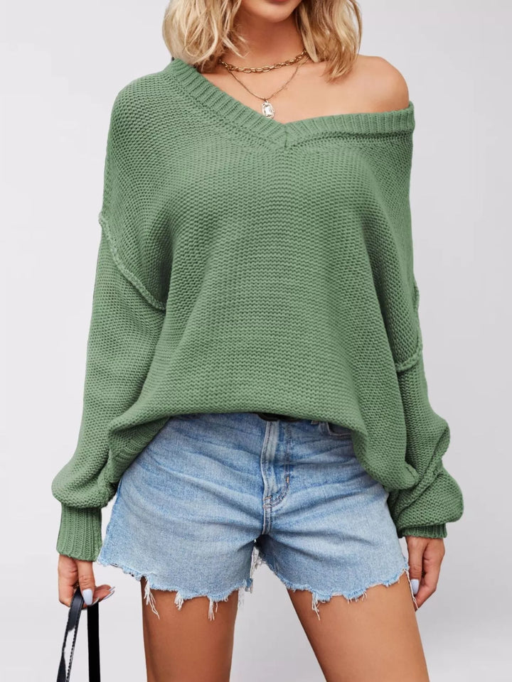 Green Drop shoulder V-neck sweater with exposed seams