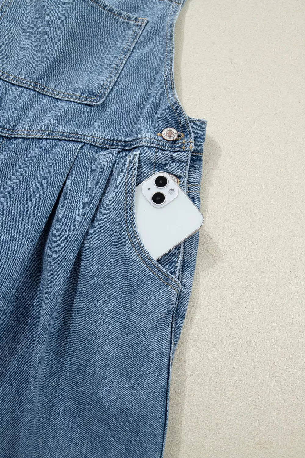 Pleated wide-leg denim overall jumpsuit with bib pocket