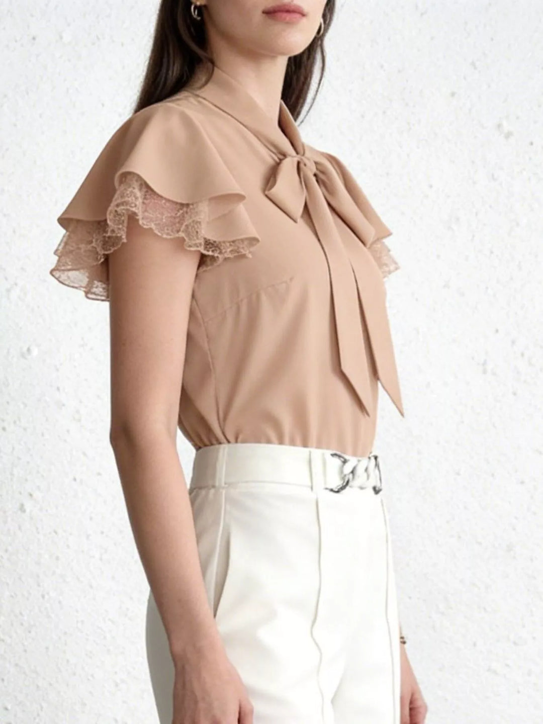 Tie-neck ruffle cap sleeve blouse with lace trim