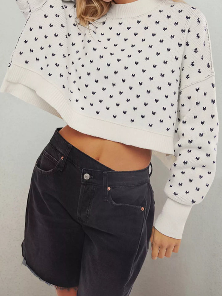 White Dropped shoulder knit sweater with ribbed trim and side slits