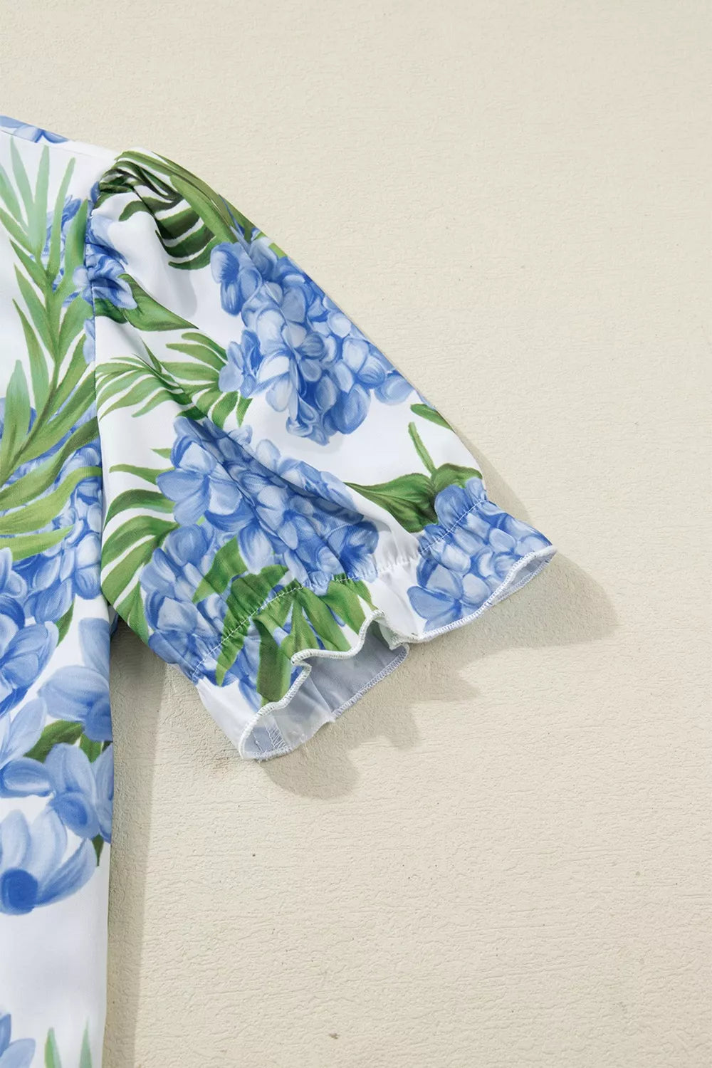 Tropical floral and stripe patchwork blouse with ruffle trim