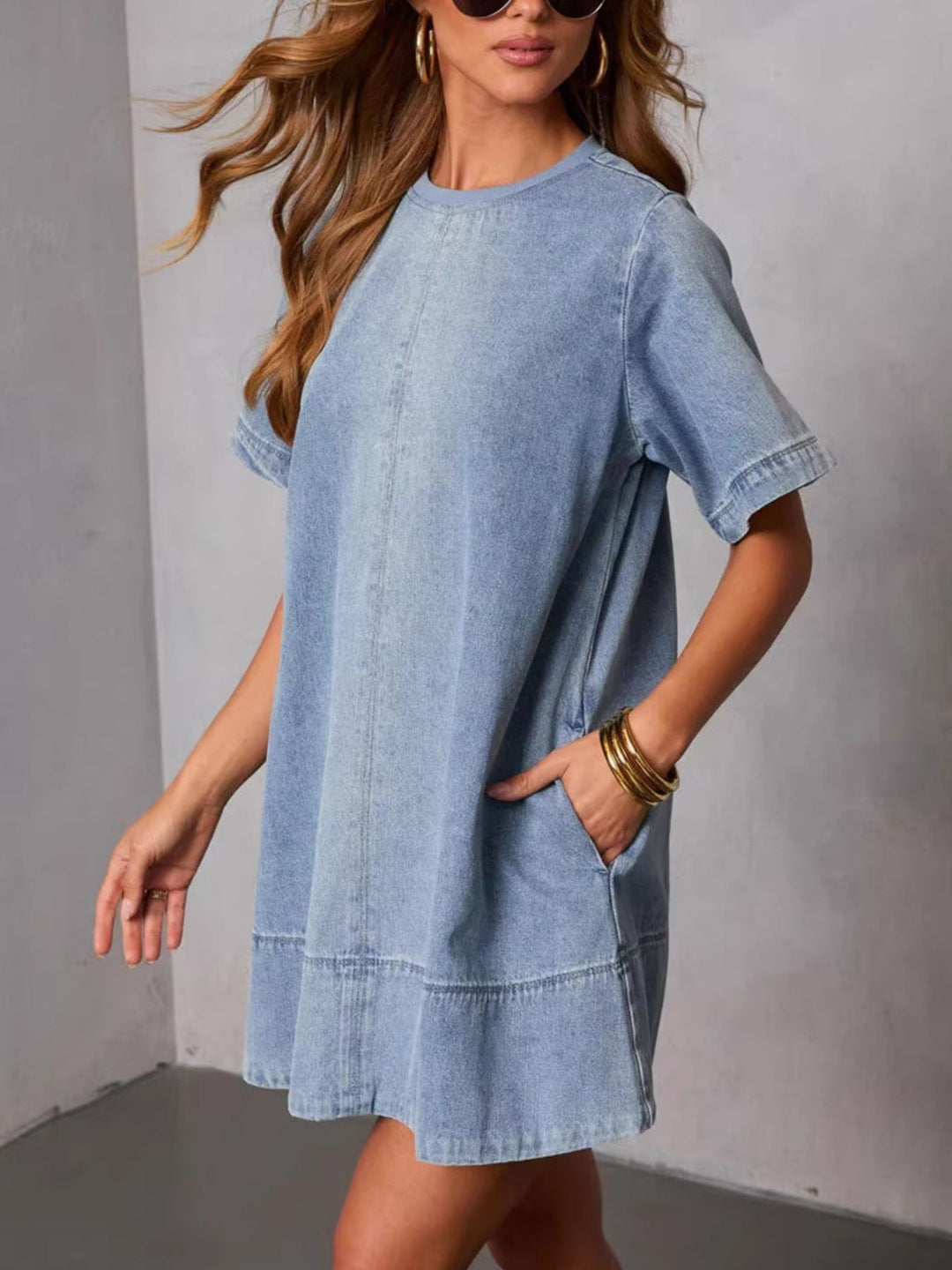 Relaxed short sleeve denim mini dress with tiered hem