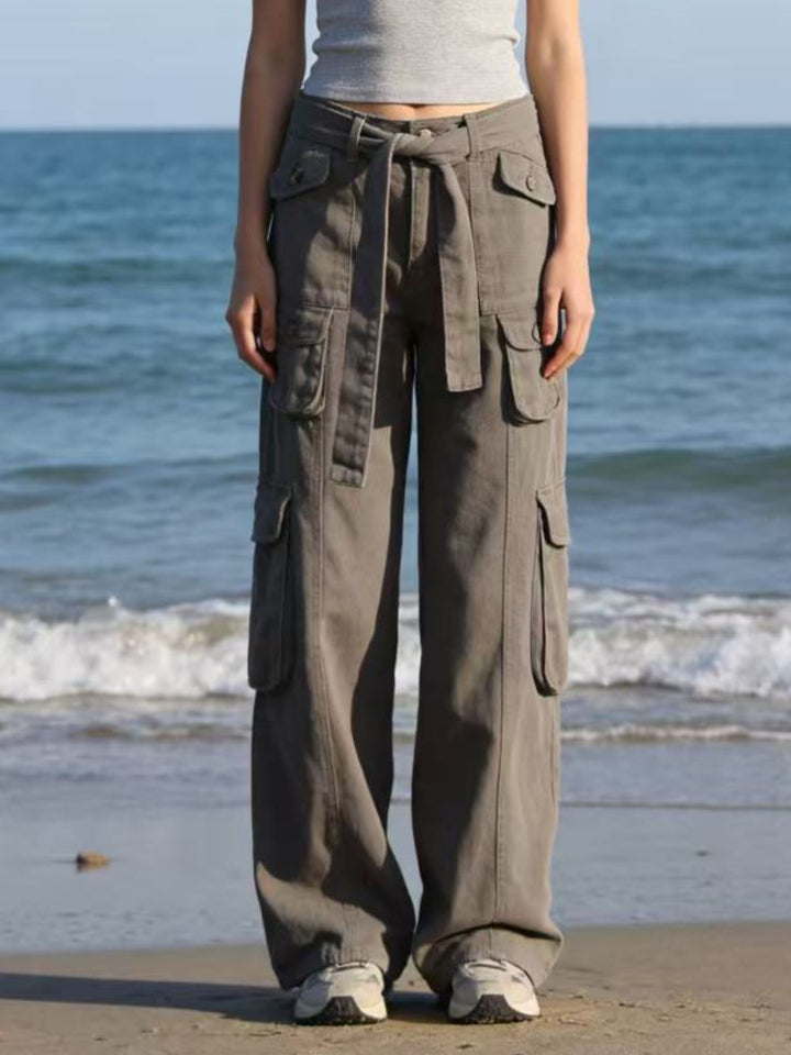 Wide-leg cargo jeans with tie belt and button-flap pockets