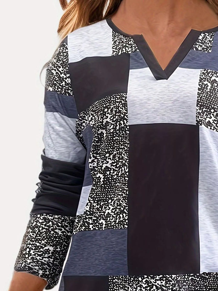 Notched neckline color-block long sleeve top with buttons