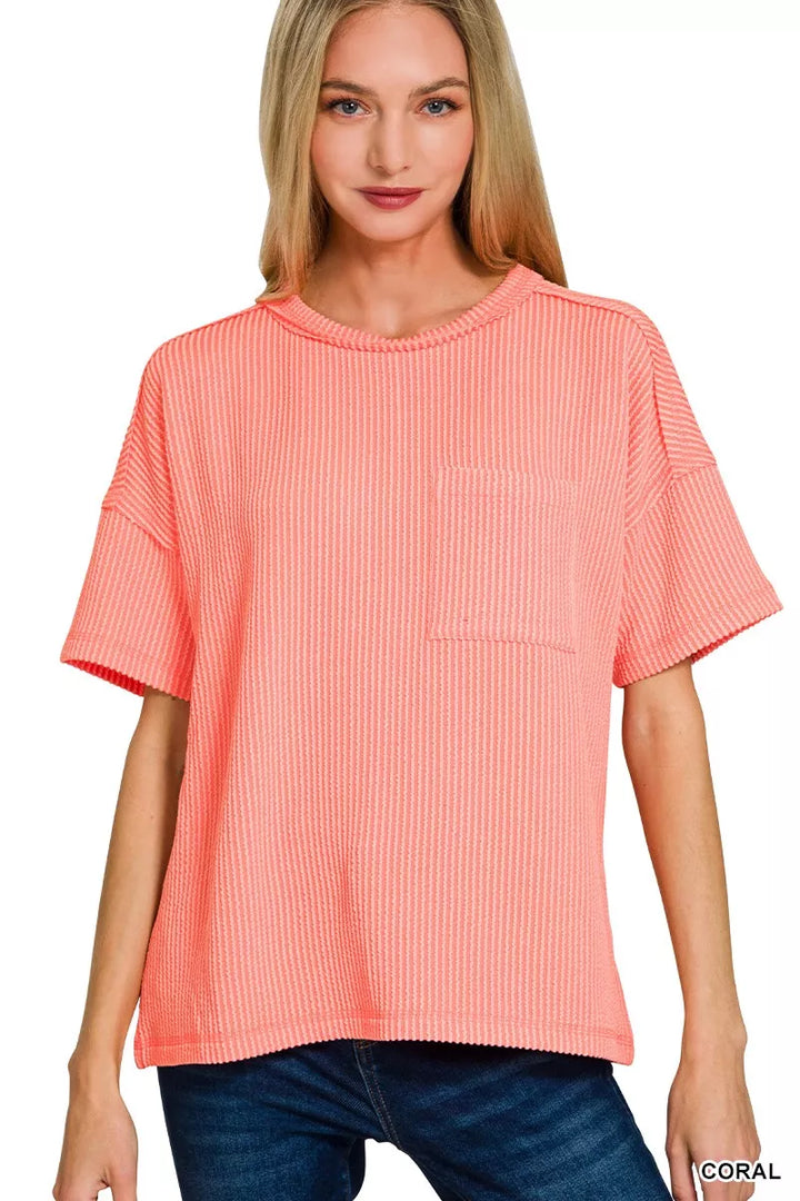 CORAL Raised rib short sleeve top with exposed seams and chest pocket