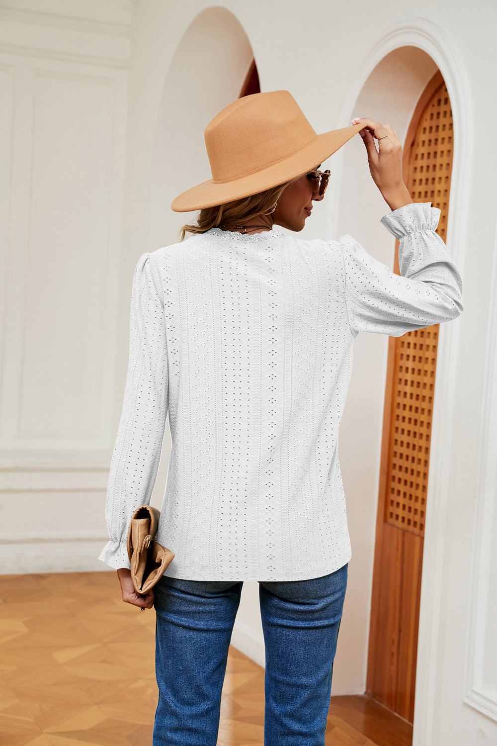 Eyelet V-neck blouse with flounce sleeves and lace trim